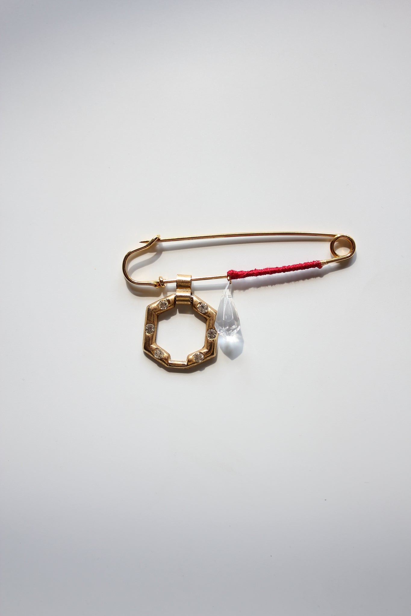RED HILO Brooch